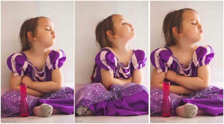 niña enfadada con vestido púrpura expresando sus emociones libremente gracias a la disciplina positiva para padres